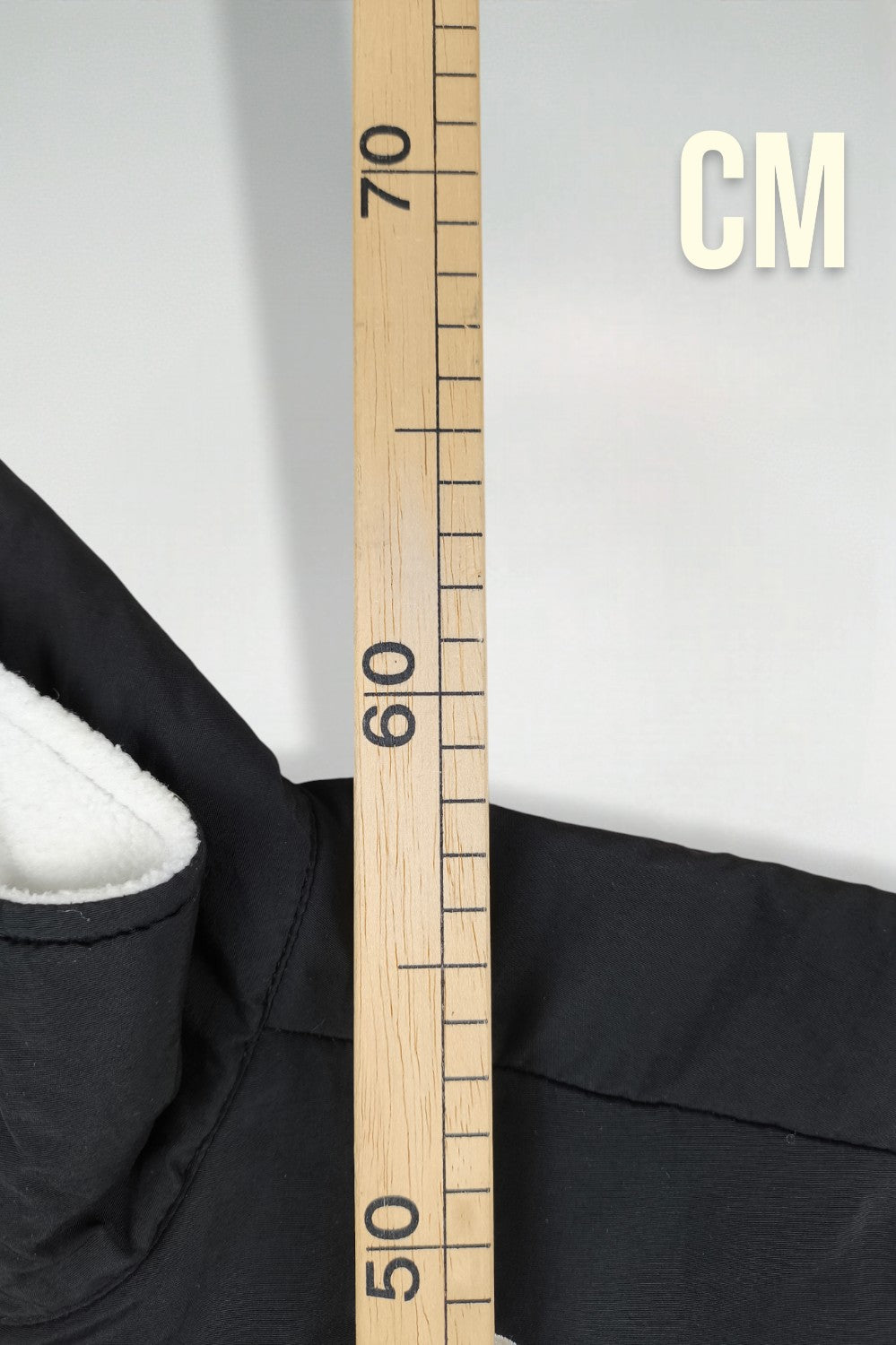 Giacca in pile vintage The North Face da donna, nera e bianca | Abbigliamento outdoor anni 2000