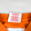 Maglietta vintage con grafica dei Miami Dolphins della NFL, verde acqua e arancione | Abbigliamento per tifosi anni 2000