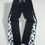 Jeans vintage Levi's Custom Rework con stampa mucca, neri | Pantaloni in denim anni 2000