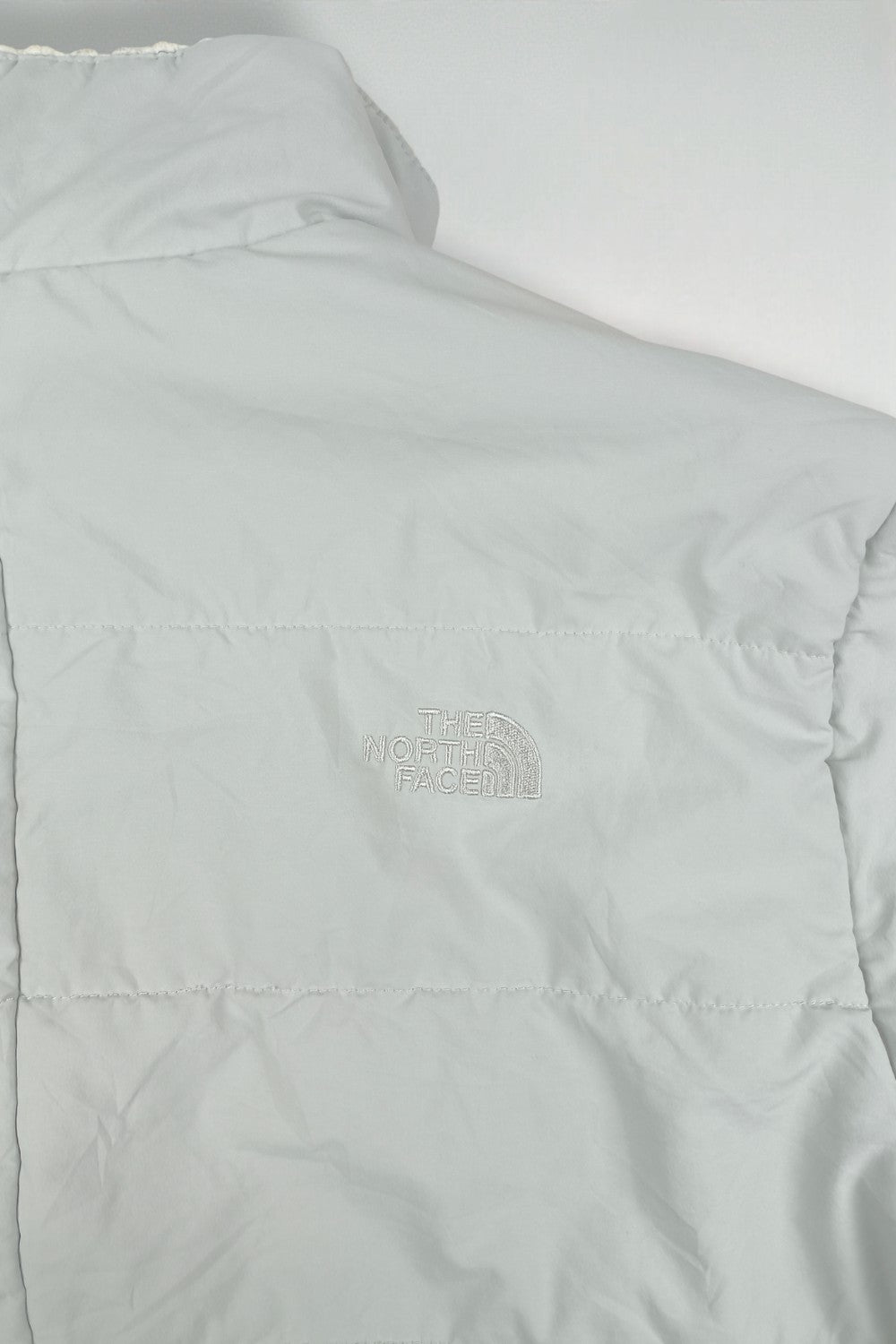 Giacca imbottita reversibile in sherpa The North Face vintage, grigio chiaro | Capispalla per esterni anni 2000