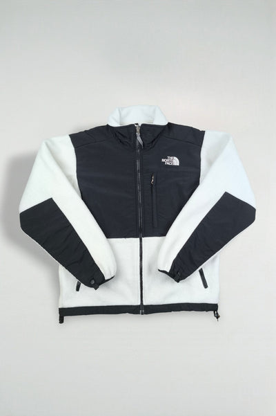 Giacca in pile vintage The North Face da donna, nera e bianca | Abbigliamento outdoor anni 2000