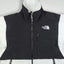 Giacca in pile vintage The North Face da donna, nera e bianca | Abbigliamento outdoor anni 2000