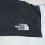 Giacca in pile vintage The North Face da donna, nera e bianca | Abbigliamento outdoor anni 2000