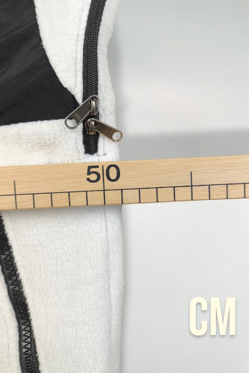Giacca in pile vintage The North Face da donna, nera e bianca | Abbigliamento outdoor anni 2000