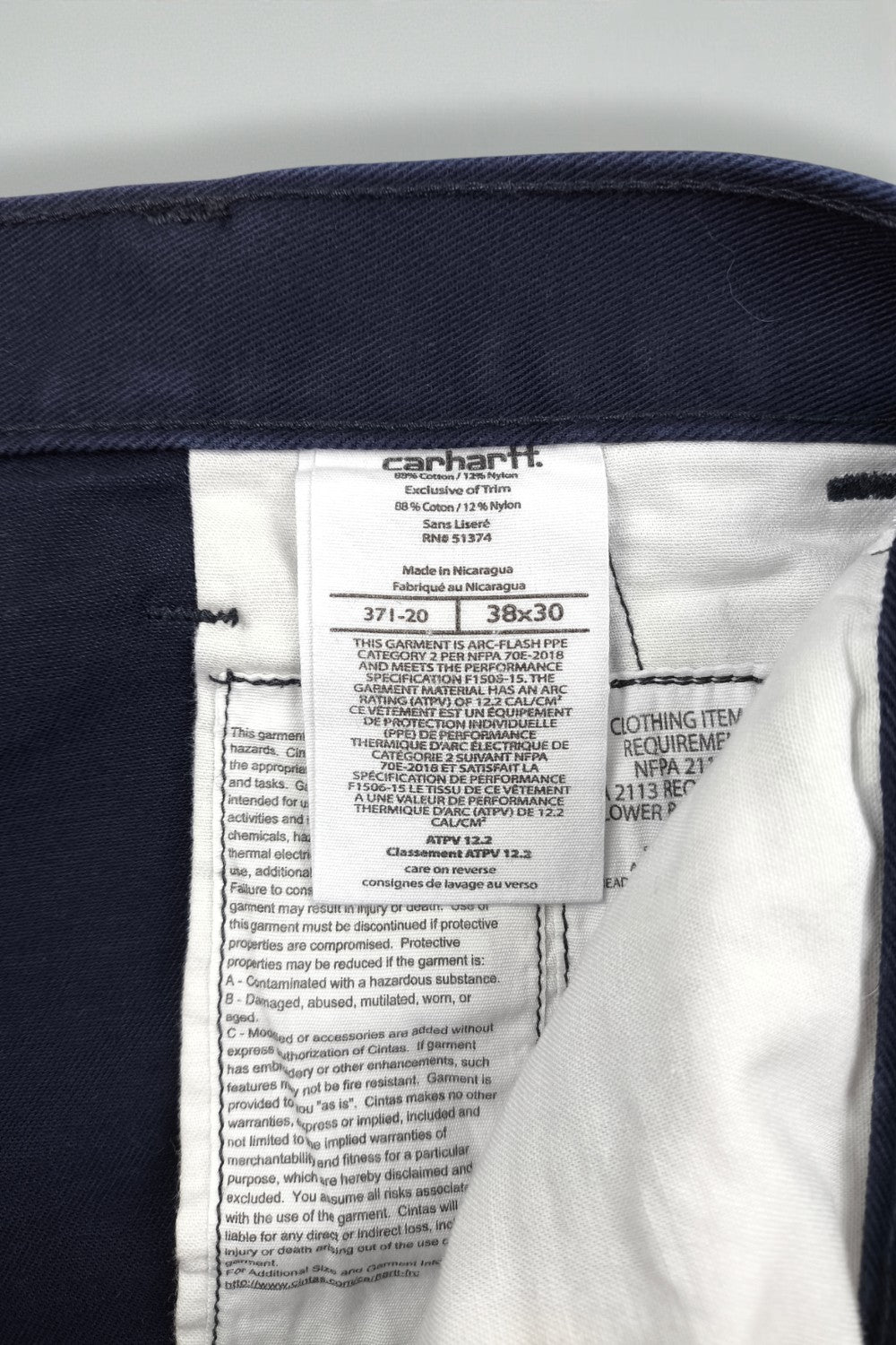 Pantaloni da lavoro Carhartt FR vintage blu navy | Abbigliamento da lavoro ignifugo anni 2000