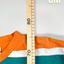 Maglietta vintage con grafica dei Miami Dolphins della NFL, verde acqua e arancione | Abbigliamento per tifosi anni 2000